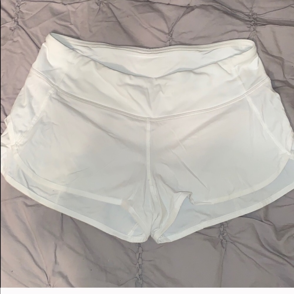 white lululemon running shorts! size 4